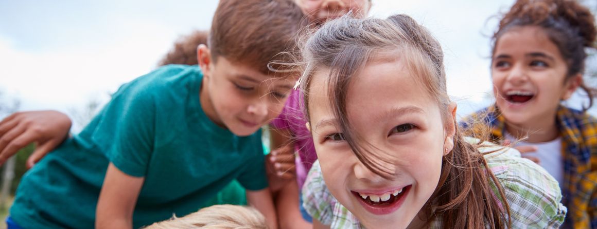 Children laughing in a park